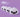 A round, face-stamped translucent squishy toy with glitter on a pastel violet surface, with three identical blurred copies behind it.