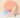 Three pastel squishy toys on matching risers against a pink studio backdrop: a fluffy yellow chick, a translucent paw with colorful pads, and a pink strawberry sandwich-cookie toy.